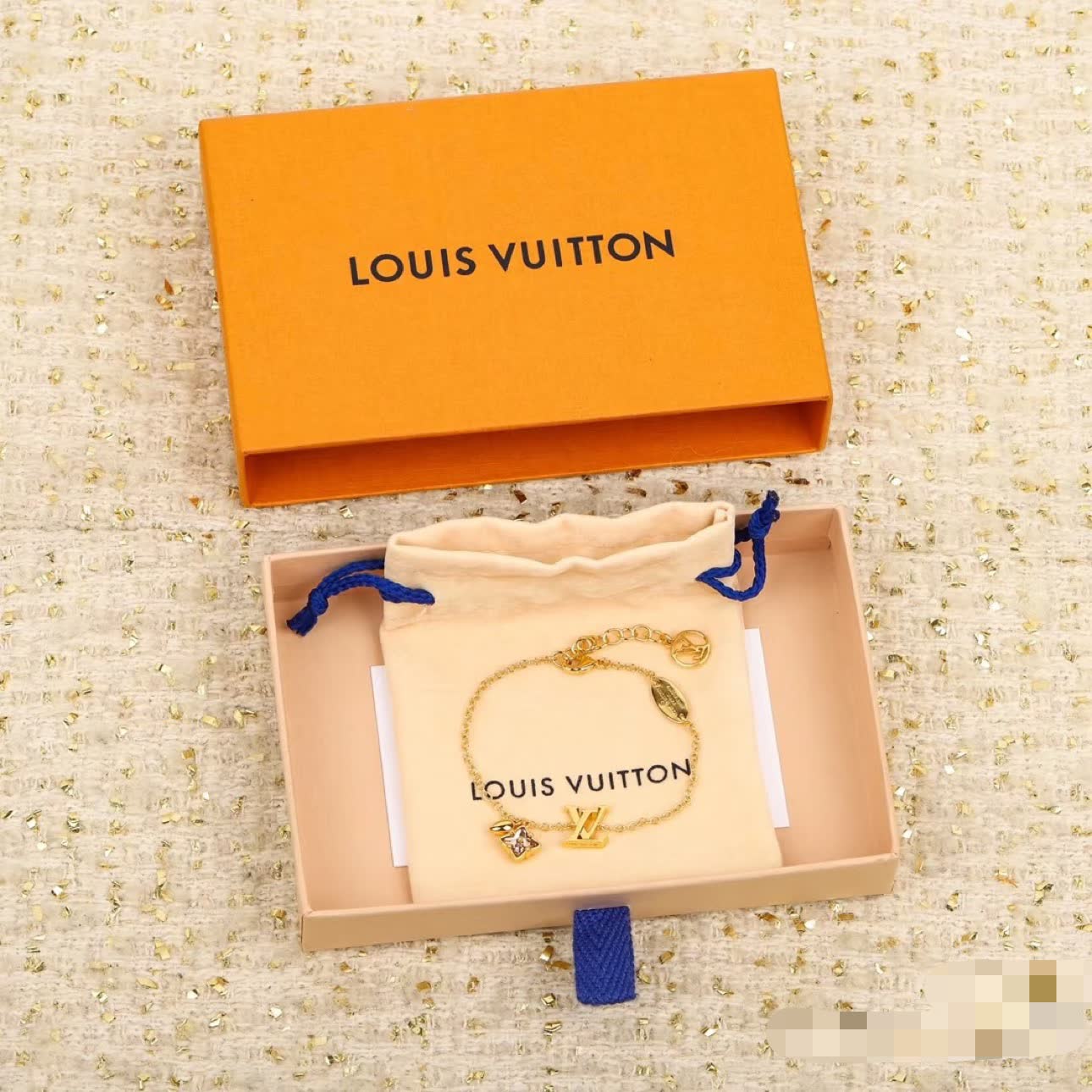 Louis Vuitton Gold Tone Bracelet with Charms
